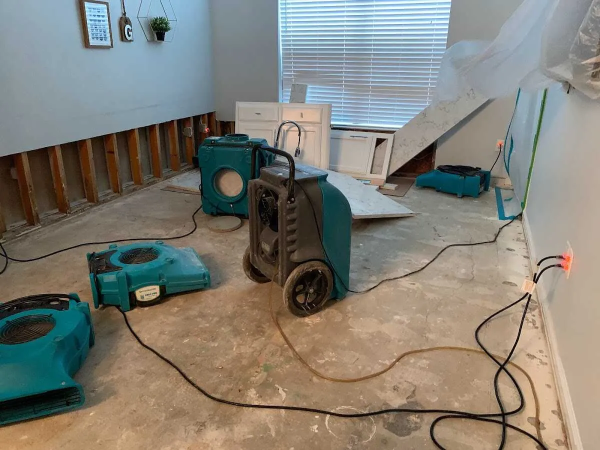 Dehumidifier in flood-cut room for Water Damage Restoration in Pebble Creek